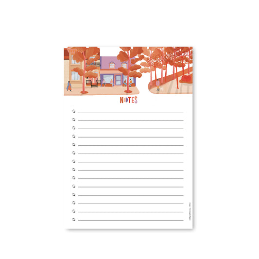 Bloc-notes illustré représentant une scène de Montréal en automne, créé par une illustratrice montréalaise